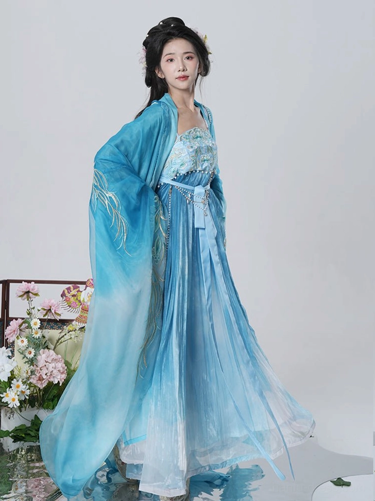 Blue gradient Tang Dynasty Hanfu Heziqun dress shown from the side with floral embroidered sleeves, matching camisole top, flowing skirt, and waist sash