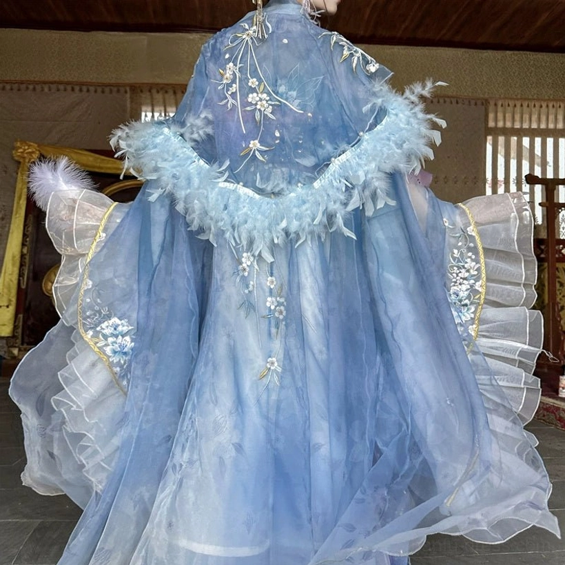 Back flat view of blue Hanfu outer cloak with floral embroidery feather collar and translucent ruffled sleeve details