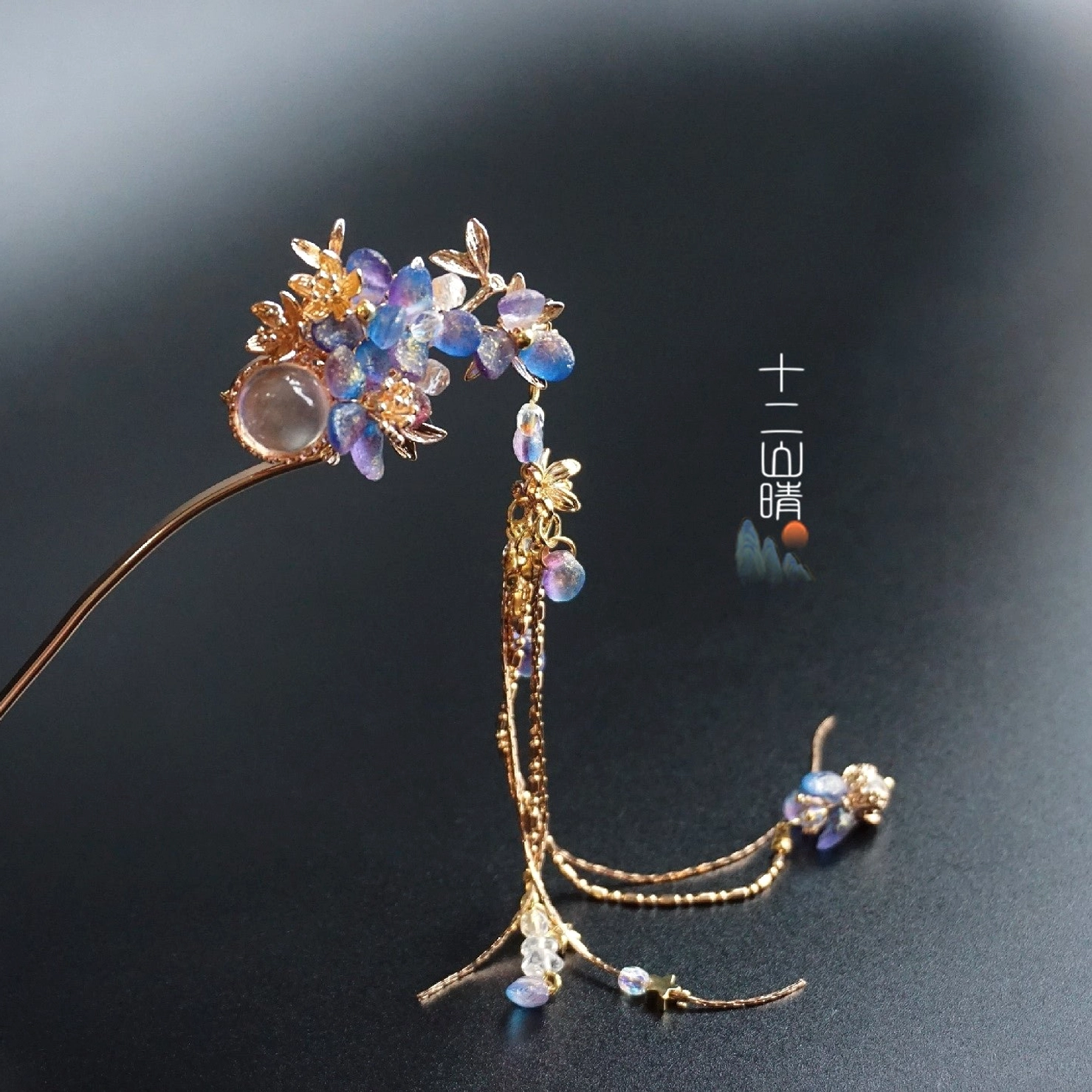 Side view of blue purple floral Chinese hairpin with split long tassels for Hanfu hairstyle styling