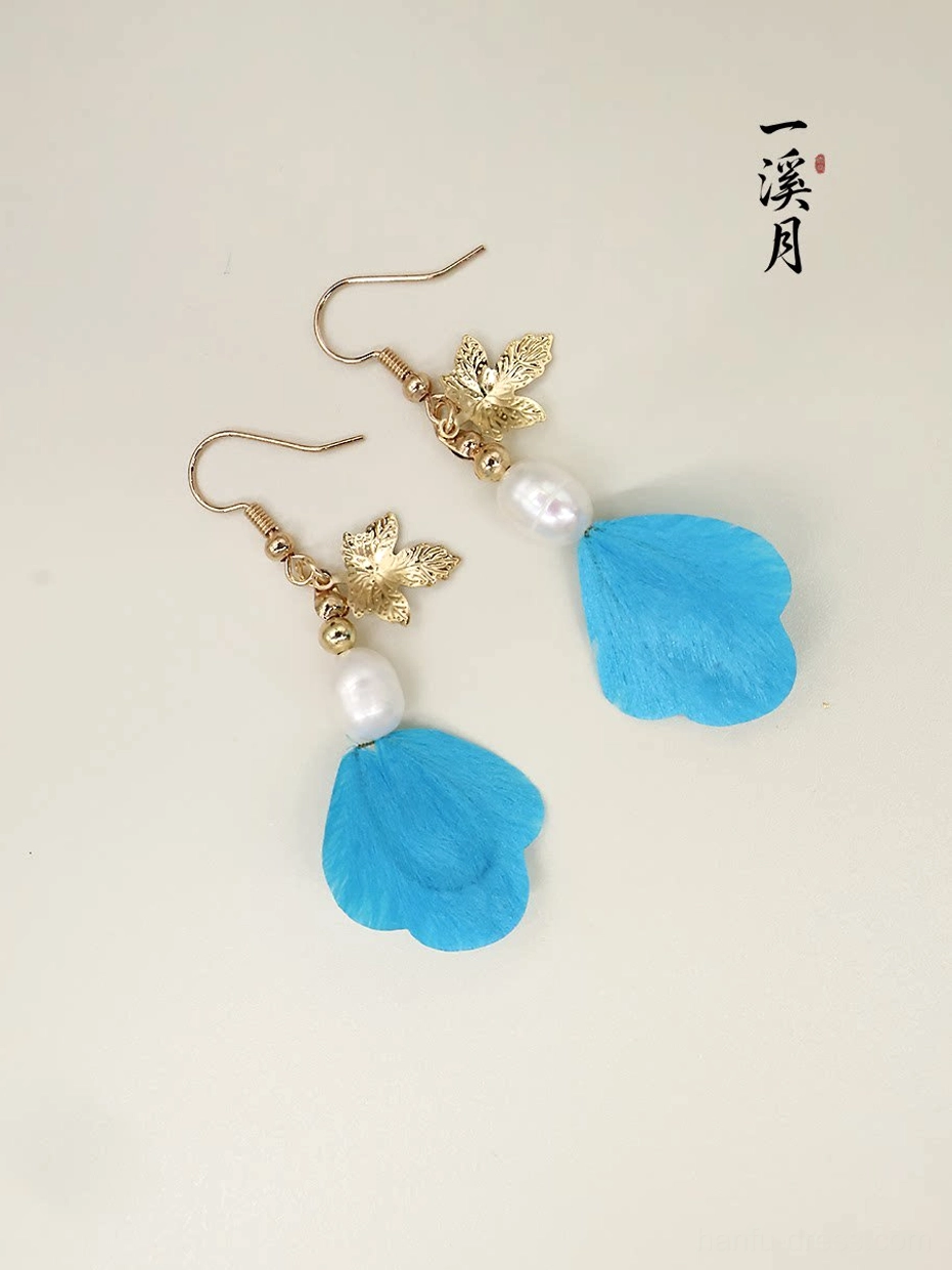 Blue scalloped velvet flower Chinese earrings with gold-tone hooks, maple leaf pendants, and pearl-like bead details on white background
