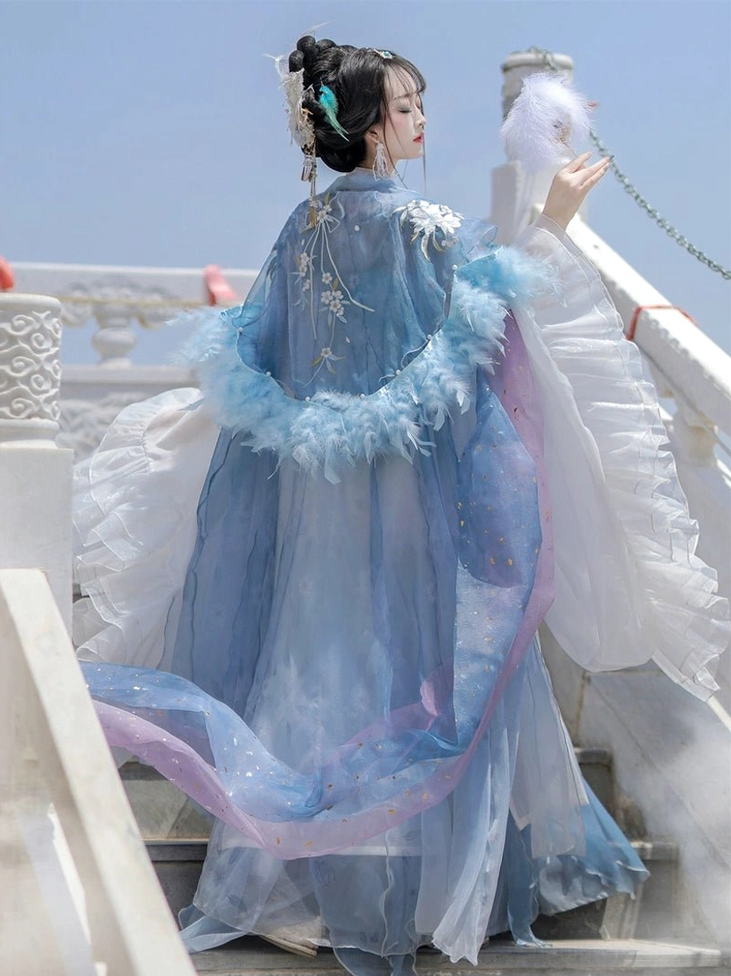 Back view of blue gradient Tang Dynasty Qixiong Ruqun Hanfu with embroidered feather-collar outer cloak and flowing skirt