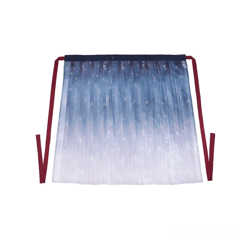 Flat lay display of blue to white gradient Hanfu wrap skirt with floral print, pleats, and red side tying straps