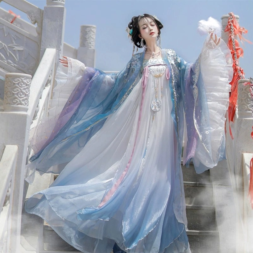 Blue and white Tang Dynasty Qixiong Ruqun Hanfu set with sheer ruffled sleeves pink sash and ornate chest jewelry
