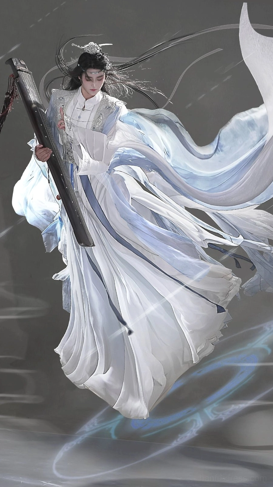 Low-angle full-body view of a blue and white unisex Hanfu set with a dramatic sweeping train, pale blue gradient details, flowing hair, and a traditional layered silhouette