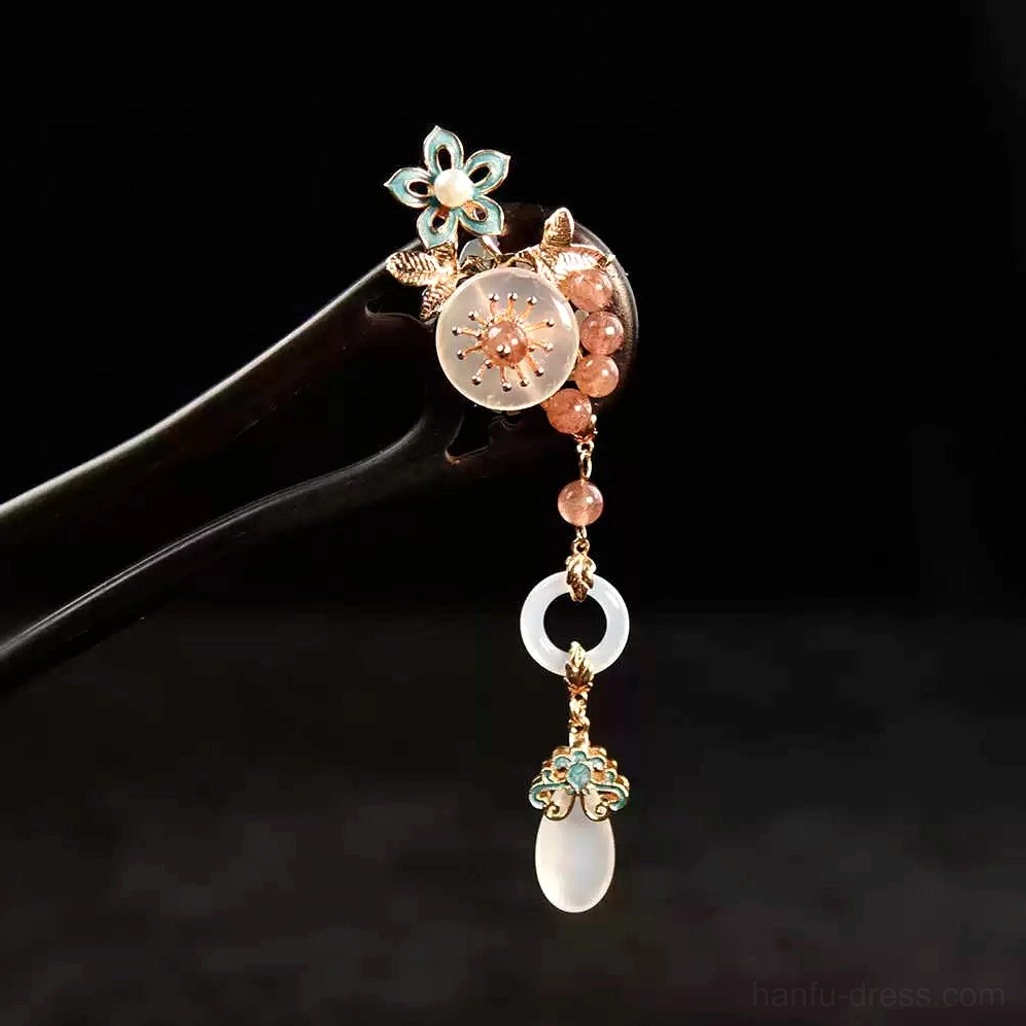 Blush floral tassel Chinese hair stick close-up with blue enamel flower pink bead chain pale jade-style pendants and dark double-pronged hairpin