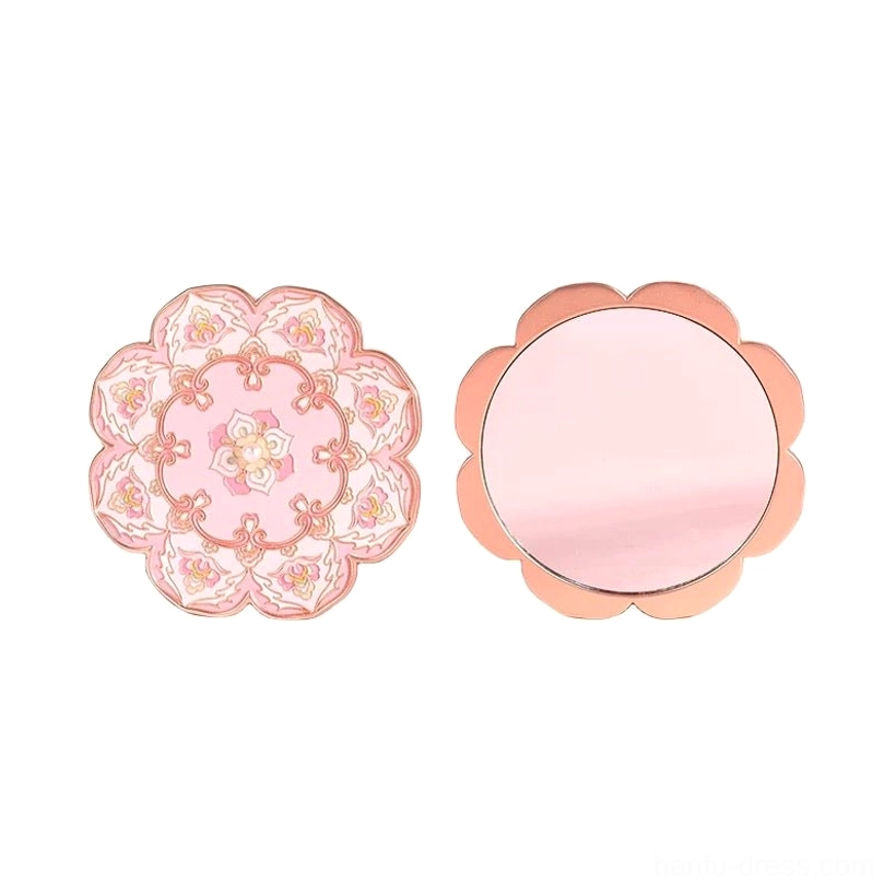 Blushing lotus blossom Chinese pocket mirror displayed open and closed on a white background, showing the reflective mirror surface and vintage pink embossed floral cover