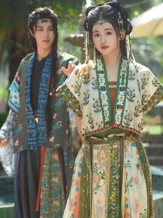 Front view of Bodhi Tang-inspired female hanfu camisole and pleated skirt with matching male layered hanfu