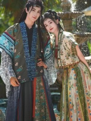 Bodhi Tang-inspired matching couple hanfu set for women and men in an outdoor garden with stone fountain