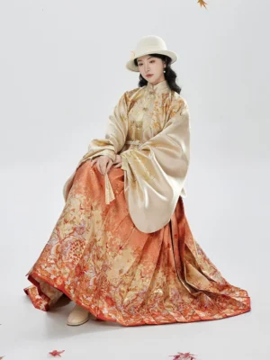 Ming Dynasty Hanfu pipa sleeve top and autumn floral mamian skirt seated side view with flowing sleeves