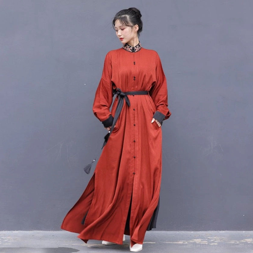 Brick red Wuxia Hanfu dress with black embroidered stand collar cuffs button front side split skirt lantern sleeves and tasseled waist sash