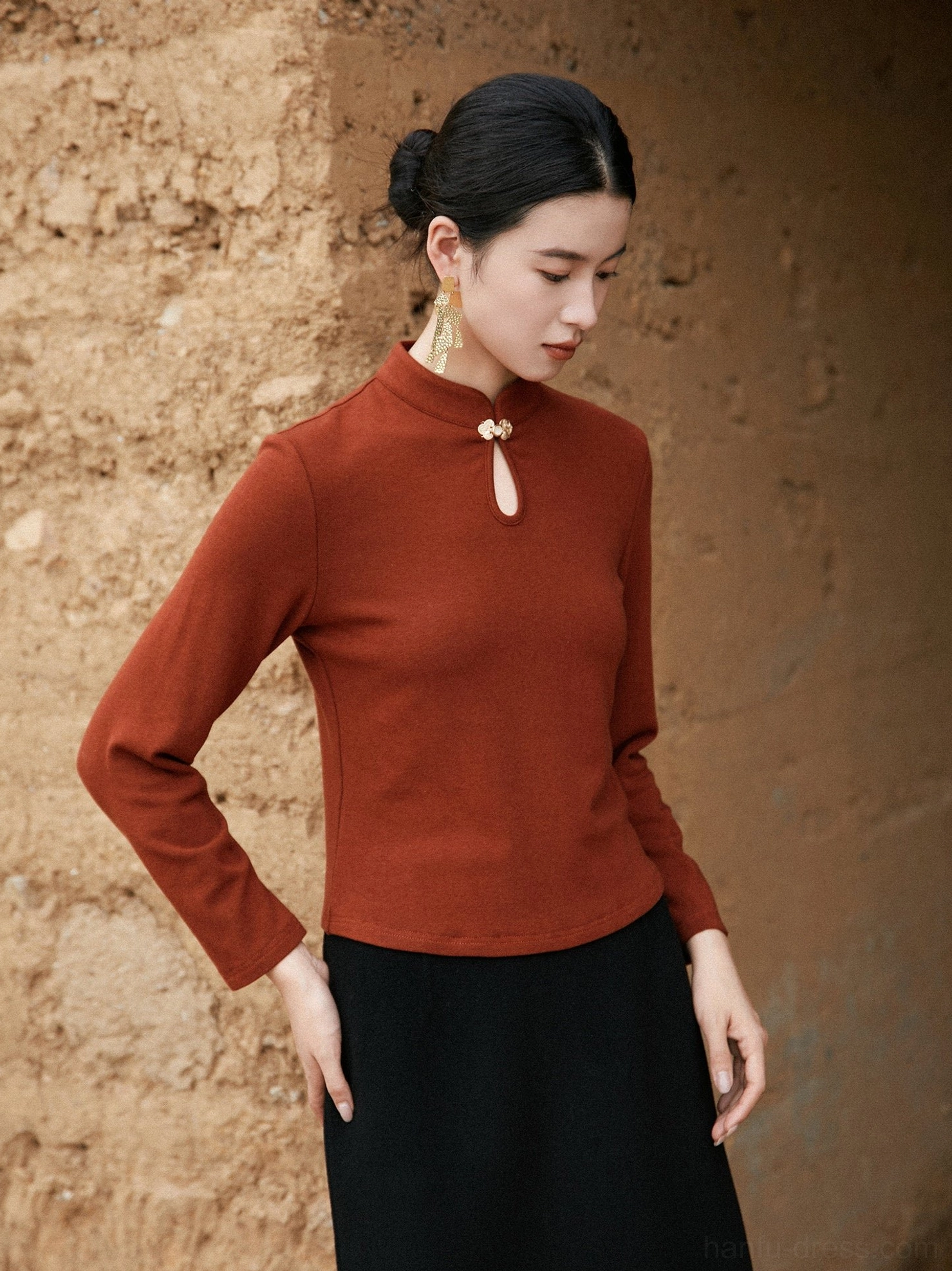 Side view of brown Modern Hanfu long sleeve knitted top showing slim silhouette and Chinese collar detail
