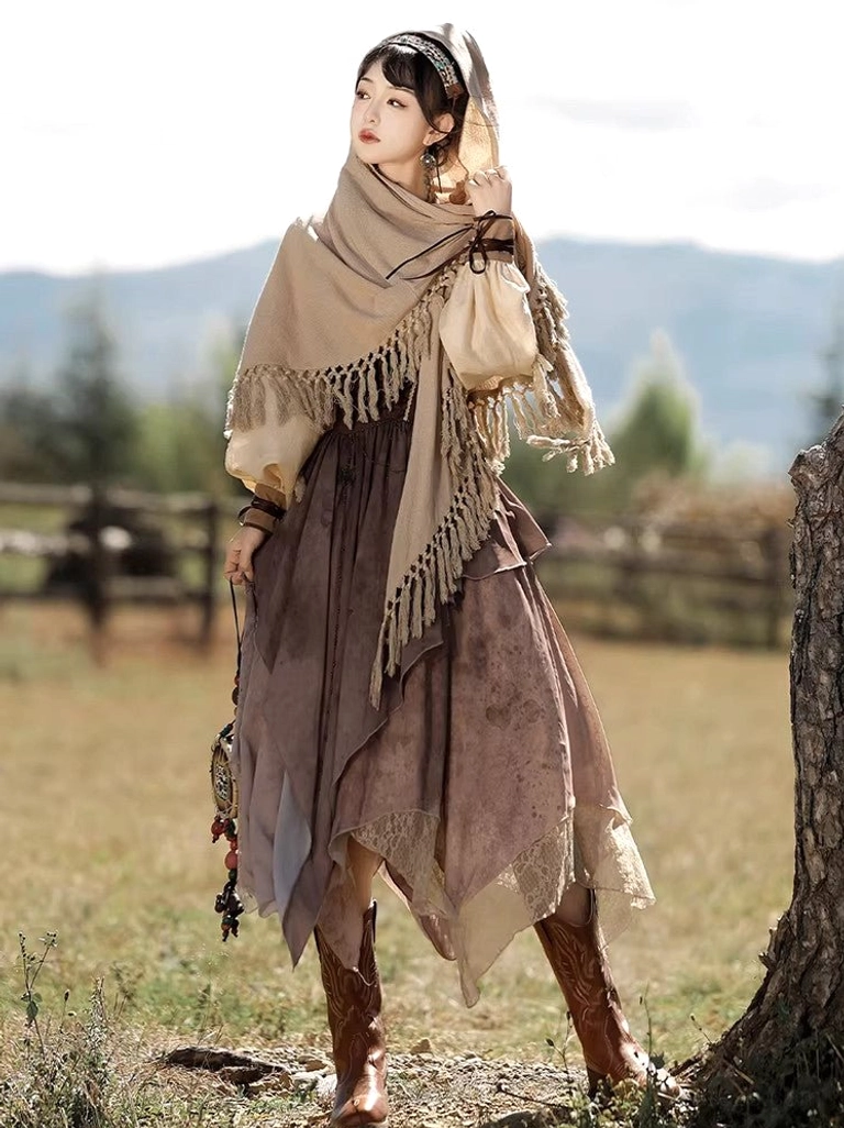 Three-quarter back view of a brown modern Hanfu outfit with hooded fringed shawl, fitted puff sleeves, gradient tie-dye suspender skirt, vintage headpiece, ethnic hanging bag, and cowboy boots