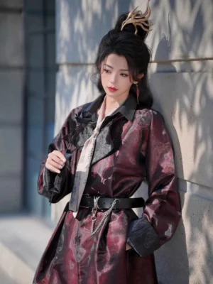 Side view of wine red demon Hanfu robe with black contrast lapels, belted waist, and traditional-inspired hairstyle