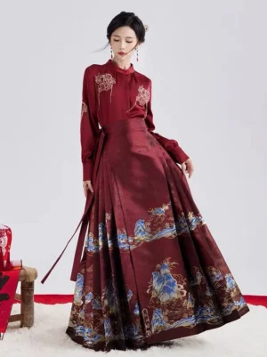 Side view of burgundy Ming style hanfu top and mamianqun horse face skirt showing the elegant pleated silhouette and side waist sash