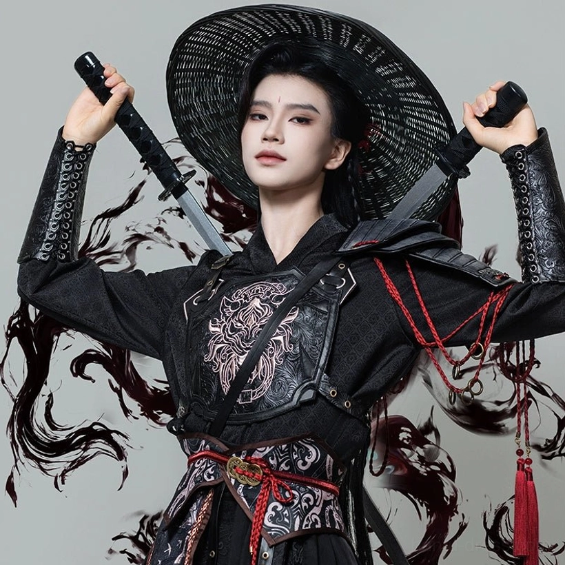 Close-up black wuxia warrior hanfu styling with dragon chest armor, red tassels, riveted wrist guards, cross-collar robe, and bamboo hat