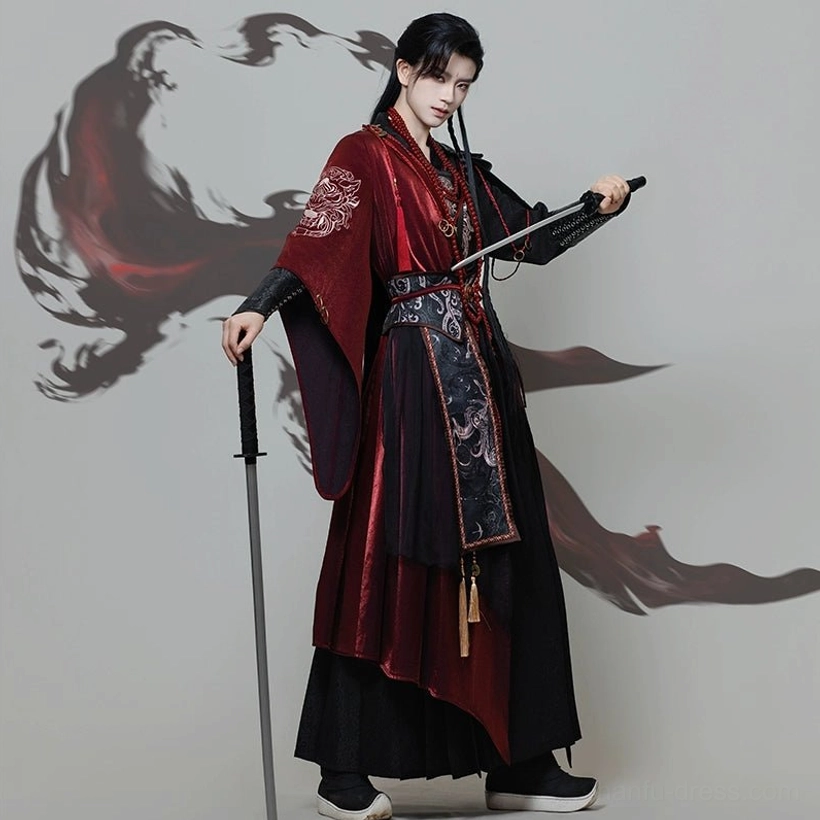 Side view of red and black male hanfu wuxia warrior costume with layered robe, embroidered waist seal, tassels, and sword styling