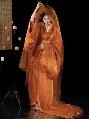 Burnt orange Han Dynasty straight hem hanfu robe set with wide flowing sleeves and gold waist belt front three quarter view