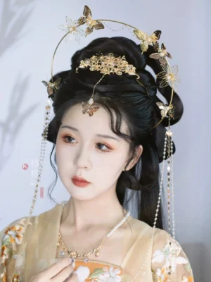 Complete Butterfly Dance Hanfu hair accessories set styled with a yellow floral Chinese outfit, antique gold butterfly halo crown, beaded tassels, and forehead pendant