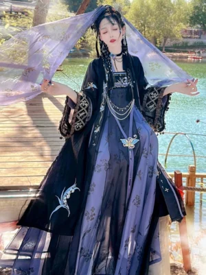 Dark purple and black Tang Dynasty Hanfu Qixiong Ruqun complete set with floral skirt prints, embroidered butterfly pendant, sheer purple veil, layered necklaces, and wide sleeves at a lakeside dock