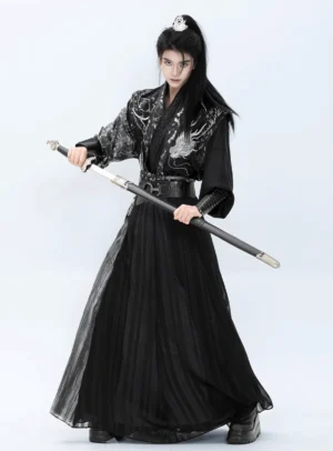 Canglan black dragon wuxia hanfu set for men shown in three-quarter front view with cross-collar robe, pleated skirt and sword