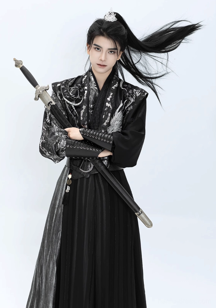 Canglan wuxia style hanfu for men in dynamic sword pose featuring silver dragon embroidery, black wrap skirt and waist belt