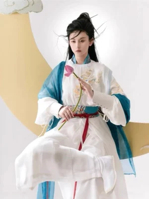 Front sitting view of Chinese xianxia God of War hanfu costume with white round neck robe gold chest embroidery blue pibo and red belt