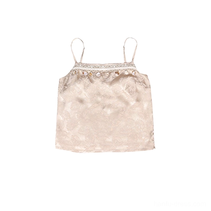 Flat lay of a champagne beige Hanfu camisole with jacquard fabric, thin spaghetti straps, and beaded embroidered neckline trim