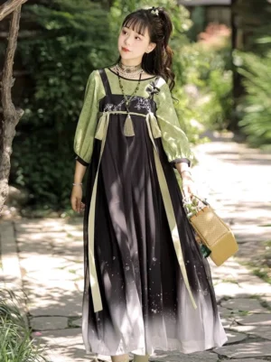 Full front view of Charlotte modern Tang style Hanfu dress with green checked sleeves, layered pinafore silhouette, chest tassel, and gradient long skirt