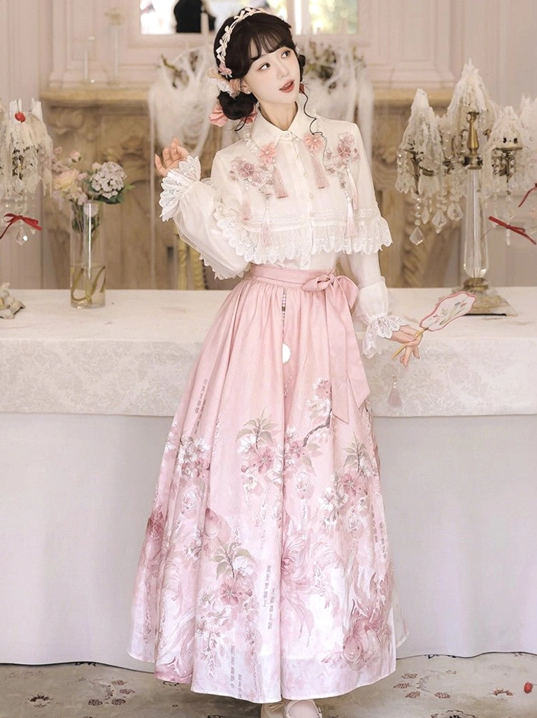 Side view of Cherry Blossom Rain modern Hanfu outfit showing sheer ruffled shawl lace bishop sleeves and pink floral printed skirt