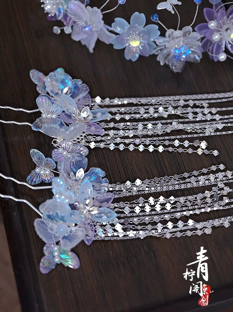 Collection of Chinese Hanfu hair pins with iridescent glazed flowers silver tassels and matching traditional hair accessory components