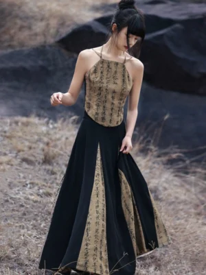 Chinese-inspired color-block Hanfu maxi skirt with vertical calligraphy print panels shown in a side three-quarter view