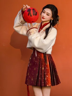 Front view of festive Chinese New Year Hanfu outfit with cream chenille cropped jacket and burgundy floral mamian skirt