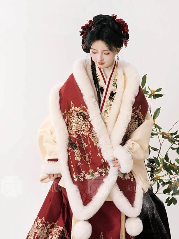 Layered Chinese New Year Hanfu styling with red embroidered shawl, white fluffy trim, tassel details, and beige Ming-style inner top