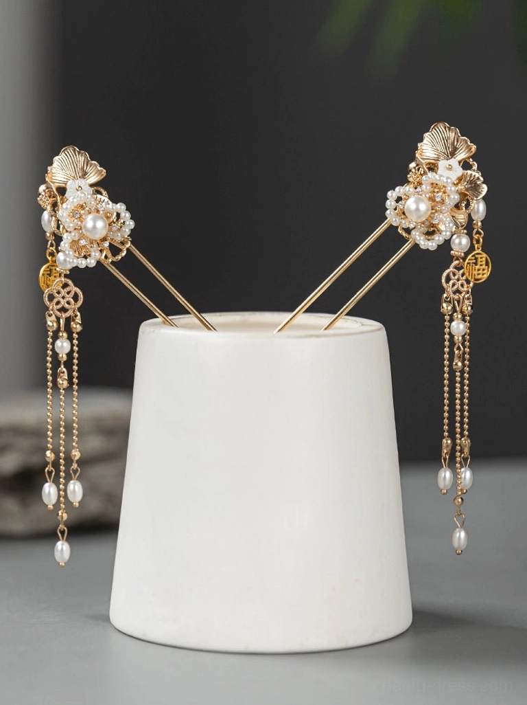 Matching pair of Chinese New Year tassel hairpins with shell-shaped faux pearl flowers long dangling chains pearl pendants and fortune-inspired charms