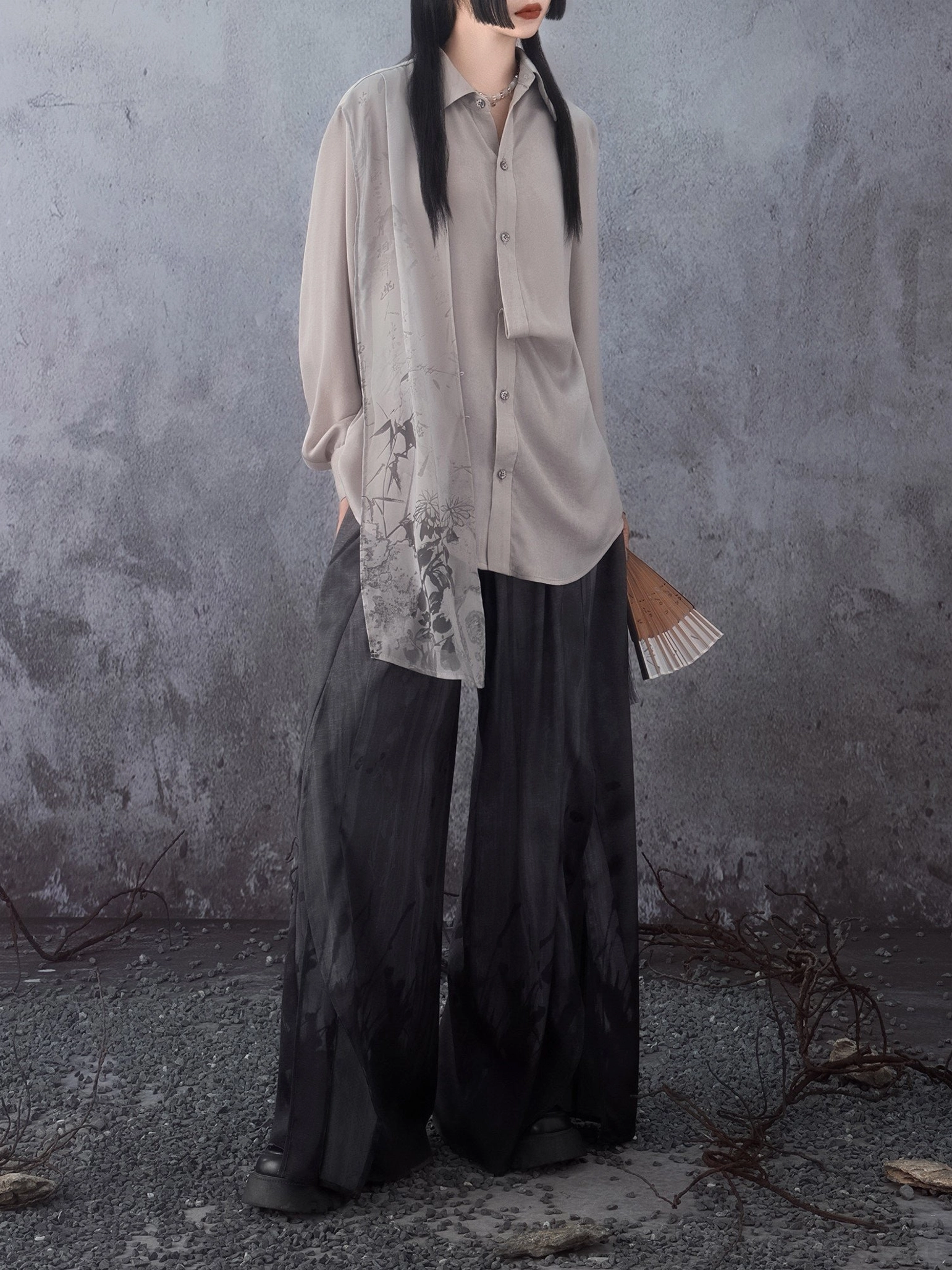 Full front view of Chinese style bamboo leaf drape shirt with button front and ink painting inspired lower hem print