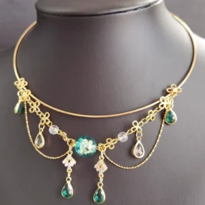 Front display of an elegant Chinese style collar necklace with gold floral fasteners, teal center bead, clear beads, green teardrop pendants, and multi-layer tassel chains