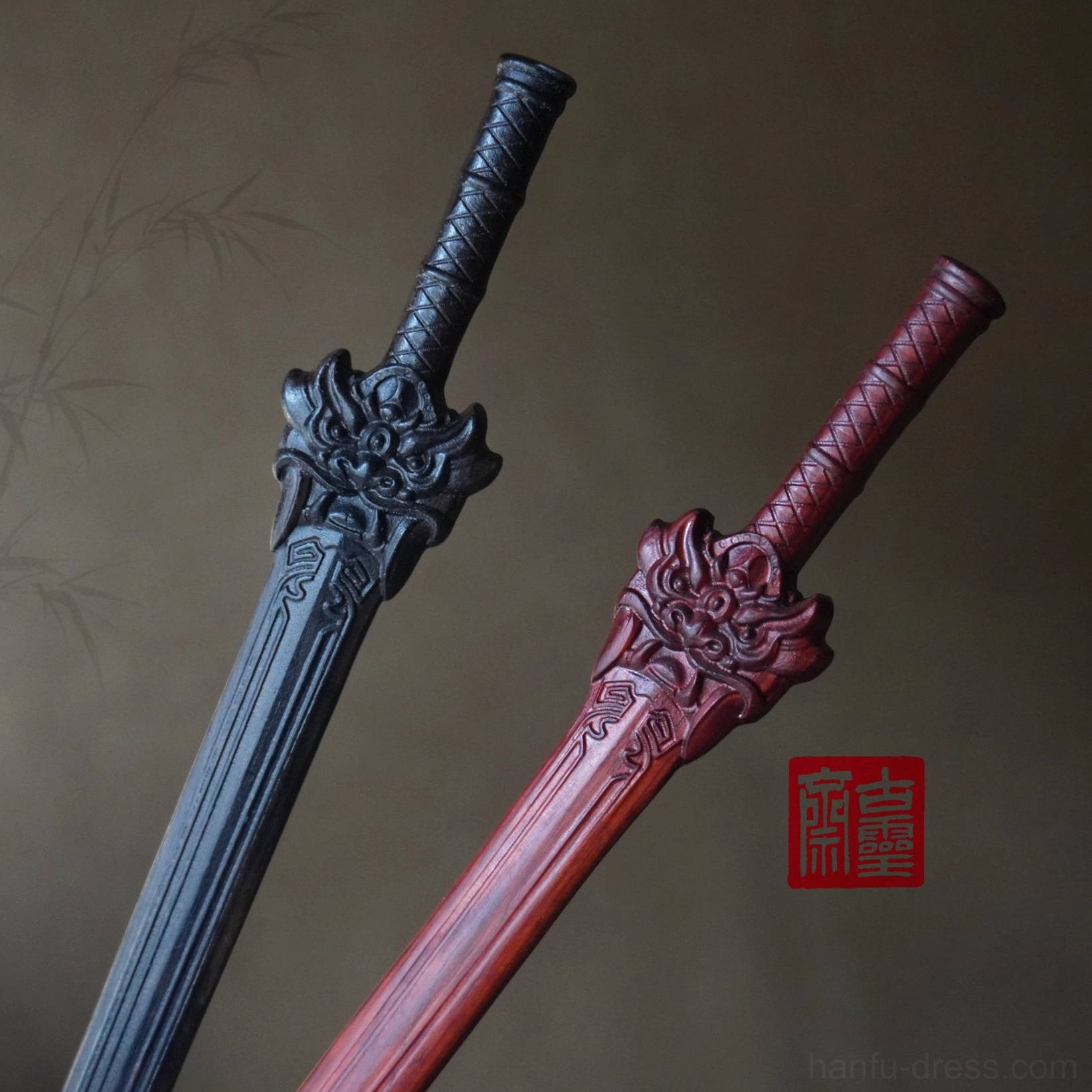 Traditional Chinese sword-shaped hair sticks in black and wine red with carved mythical beast head ornaments, textured grips, and engraved blade details for Hanfu hairstyles