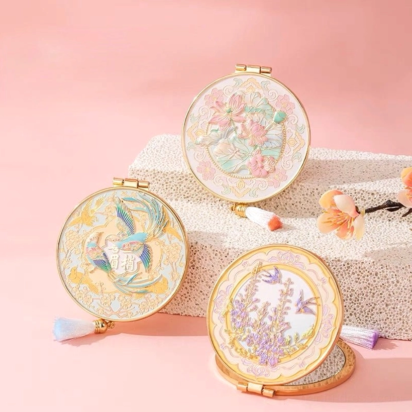 Chinese vintage folding pocket mirrors with round gold-tone frames, pastel floral bird artwork, decorative tassels, and elegant traditional Chinese styling