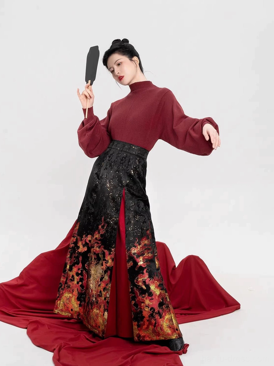 Burgundy puff sleeve turtleneck sweater with black gold dragon flame mamian skirt Hanfu styling view
