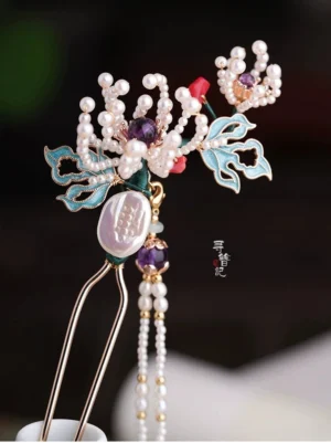 Chrysanthemum pearl tassel Chinese hair fork with blue cloisonne style leaves purple crystals red beads and baroque pearl pendant on display stand