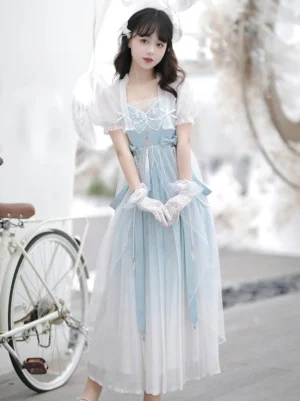Front view of modern blue and white Tang style Hanfu dress with square neckline, waist ribbons, and flowing tulle skirt