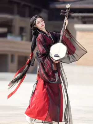 Cinnabar red and black Han Dynasty Hanfu straight hem robe set shown in a three-quarter side view with flowing wide sleeves and traditional pipa styling