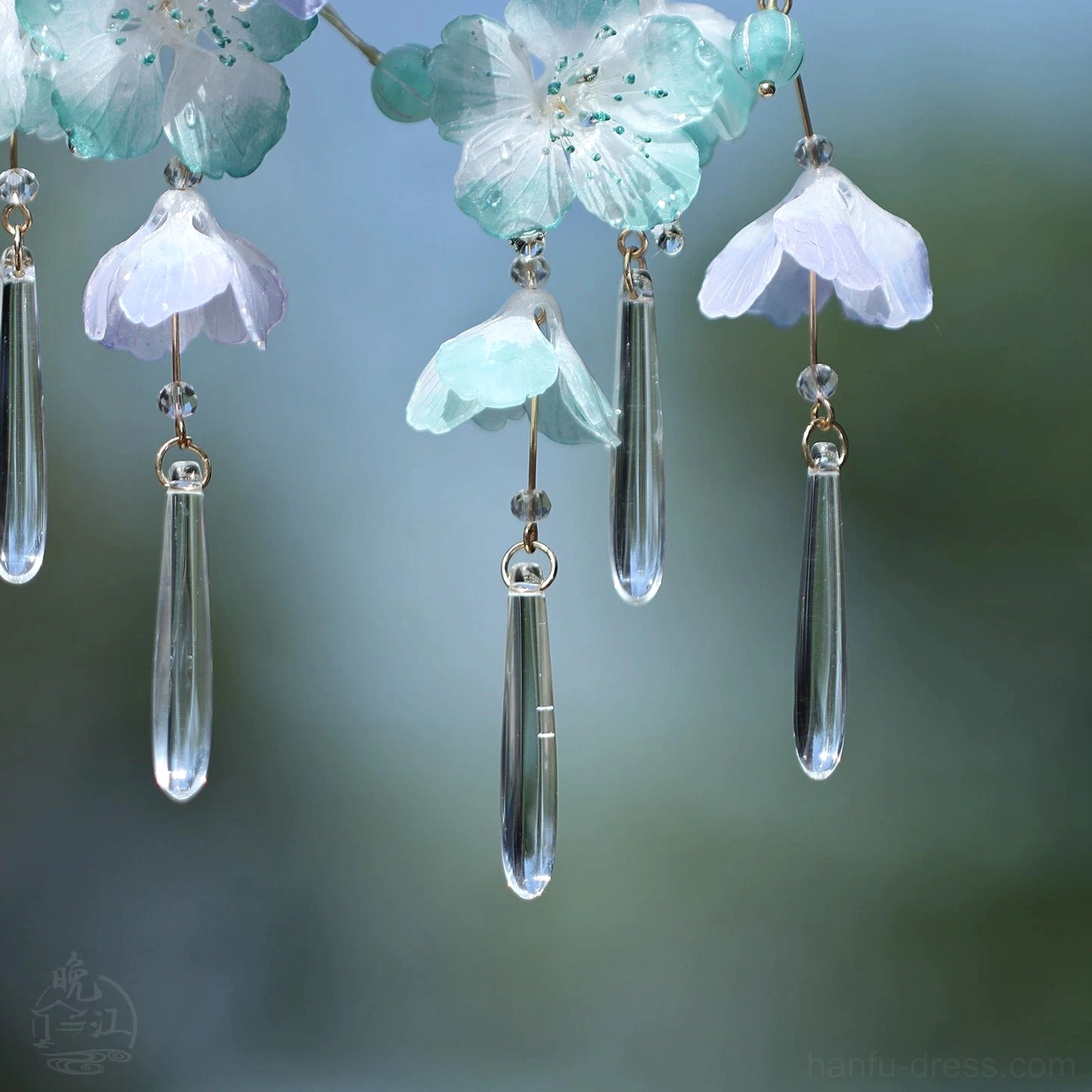 Pair of cloud and mist floral Chinese hair sticks with blue purple flower charms and long clear glass-style tassel pendants