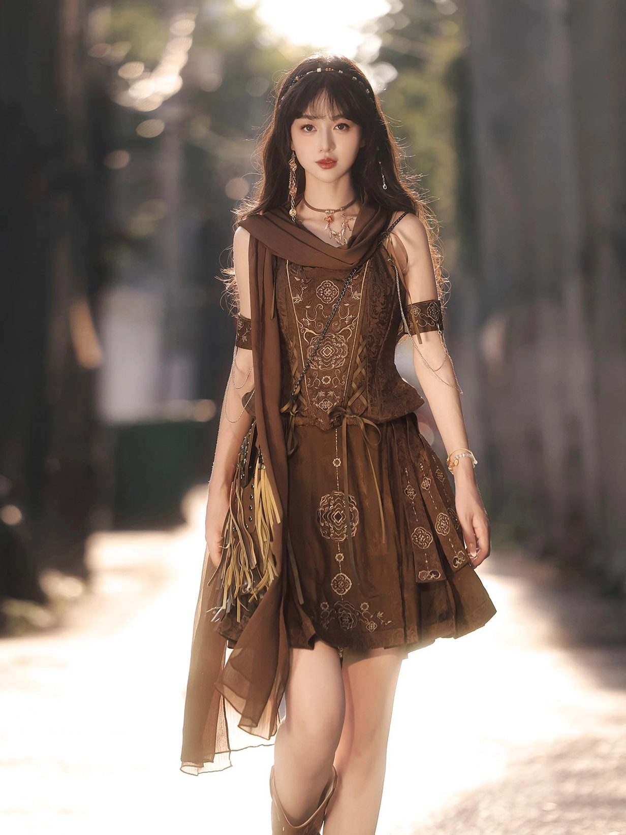 Full-body model wearing a coffee brown Ming-style Hanfu bustier and mamianqun horse-face skirt outfit outdoors in warm sunlight
