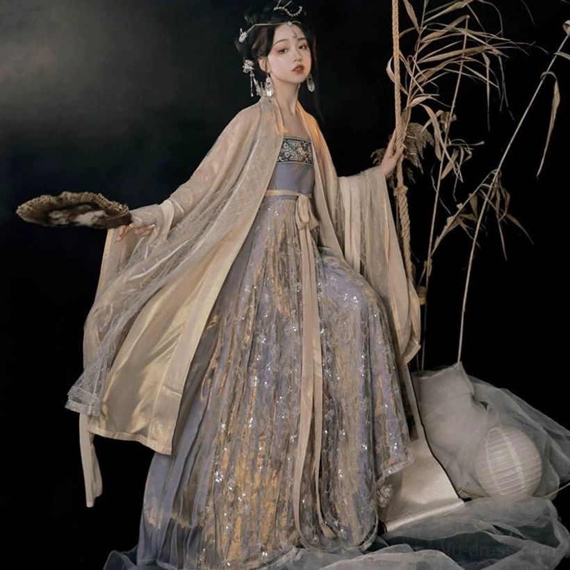 Complete Cold Tangerine Tang Dynasty Hanfu Heziqun costume with flowing wide-sleeve outer robe, shimmering lilac skirt, decorative sash, and traditional styling