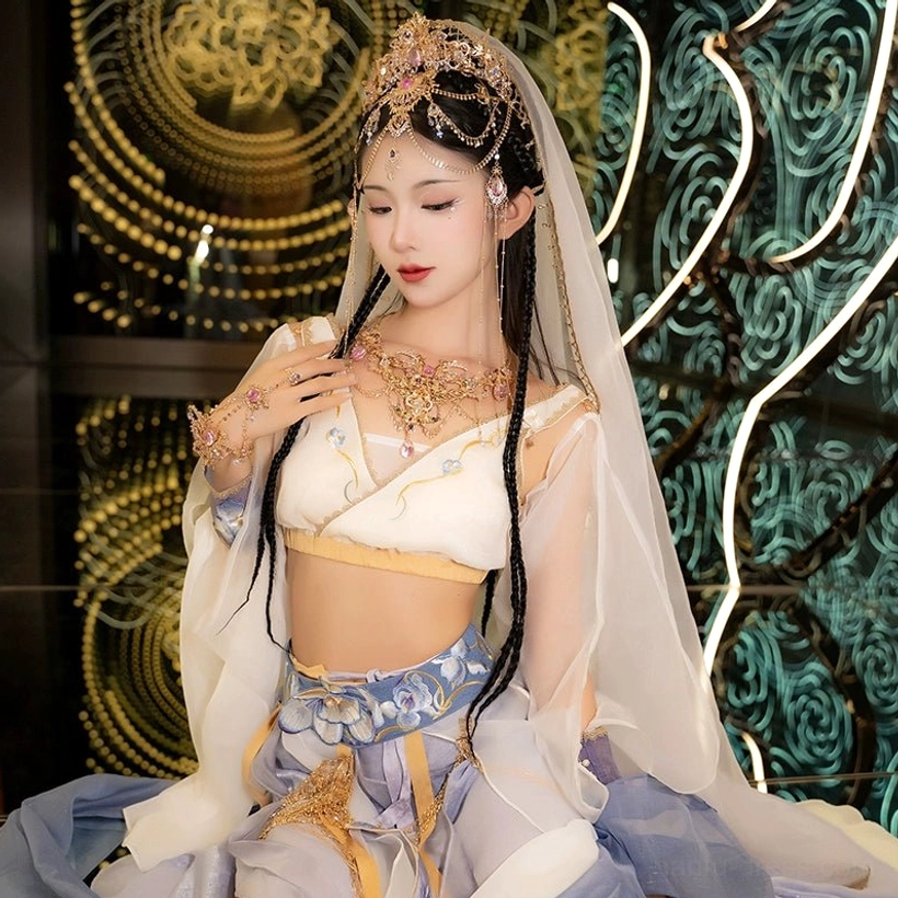 Complete Dunhuang Hanfu accessories set styled with a blue and white flying fairy Hanfu outfit, including matching gold-tone crown, necklace, bracelet, and crystal tassel details