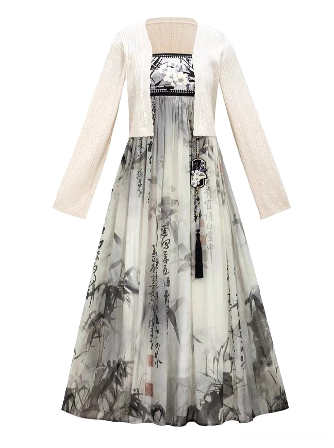 Flat lay of complete modern Hanfu set with cream knit cropped cardigan and ink wash bamboo calligraphy maxi dress