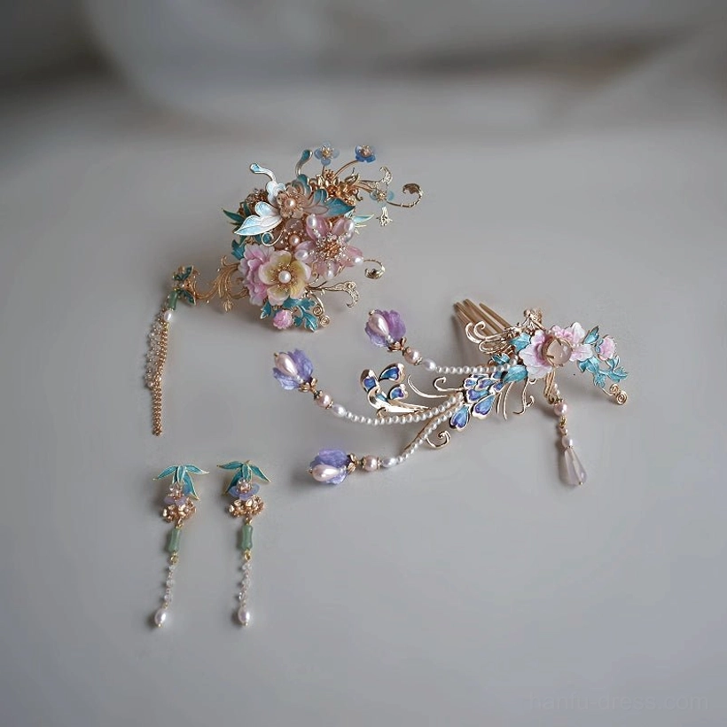 Complete Phoenix and Peony Hanfu hair accessories set displayed flat with floral hair ornament, side hairpins, matching drop earrings, blue purple crystals, and pearl-style tassels