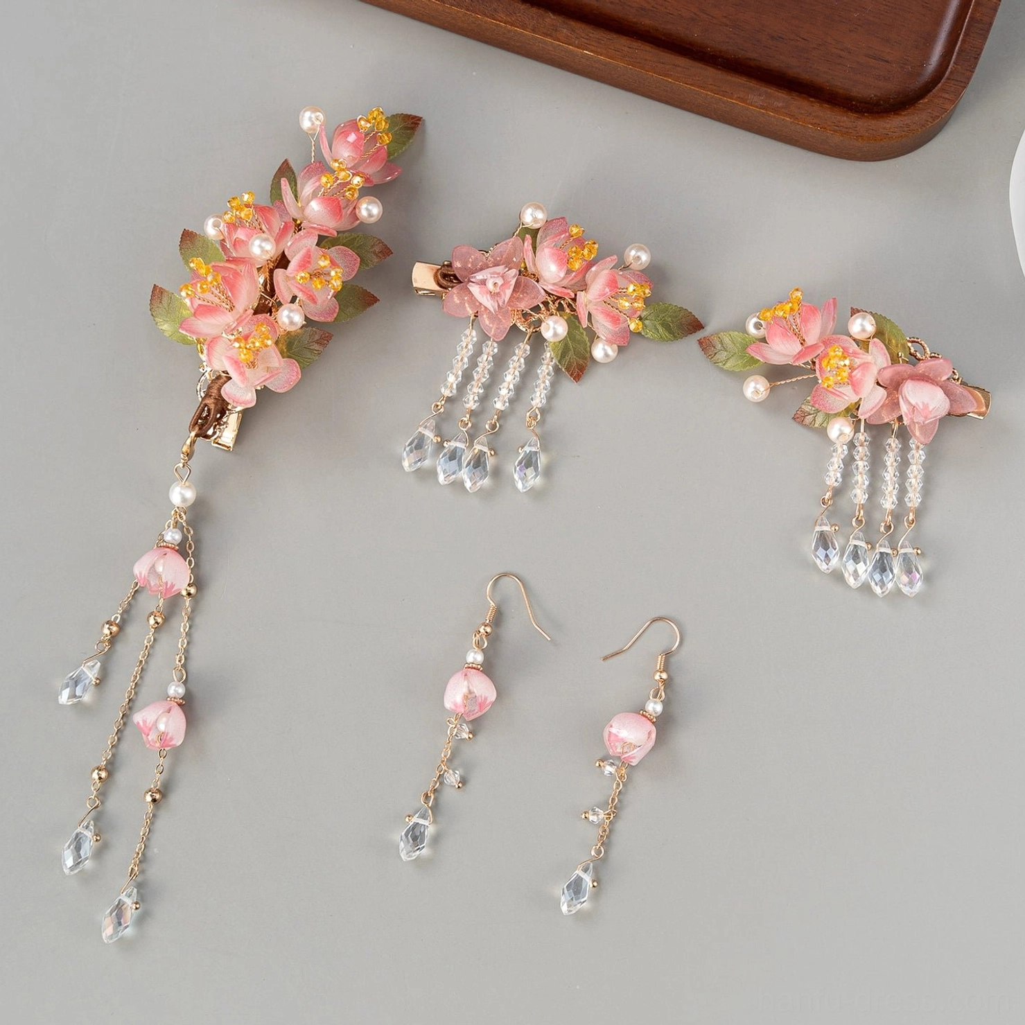 Complete romantic Hanfu hair accessories set with two pink flower clips, side hair ornament, matching dangle earrings, pearl accents, pink beads, and crystal charms