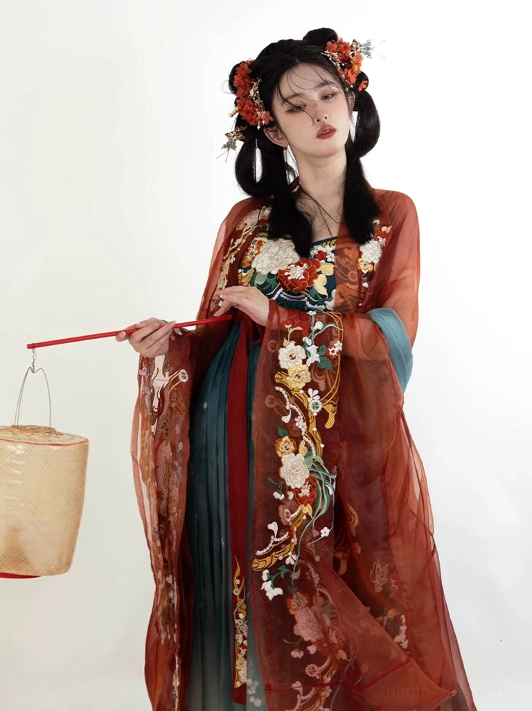 Complete Tang Dynasty Hanfu Heziqun set featuring an embroidered rust red outer robe, gradient teal floor length pleated skirt, red waist ribbons, and floral styling